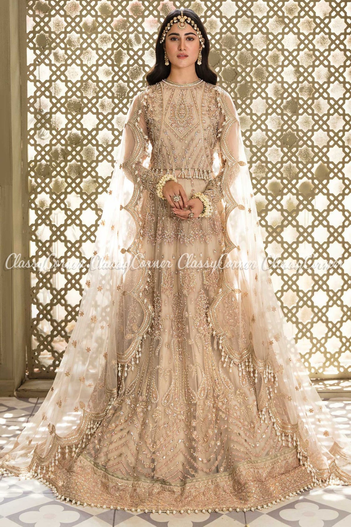 Beige Net Embellished Wedding Wear Lehenga Choli