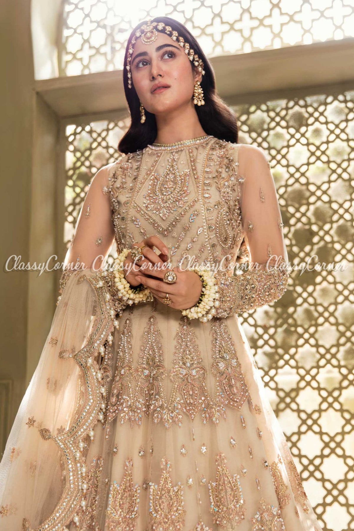 Beige Net Embellished Wedding Wear Lehenga Choli