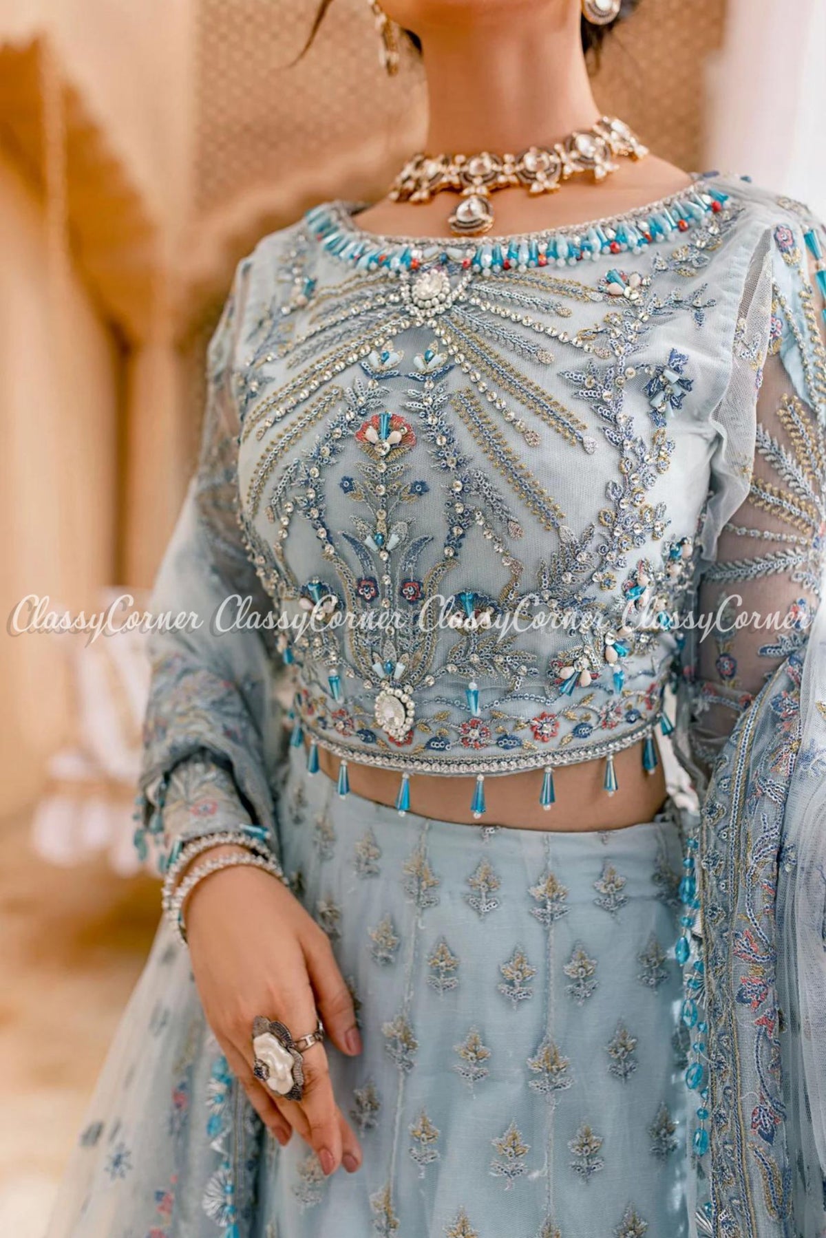 Sky Blue Net Embellished Wedding Wear Lehenga Choli